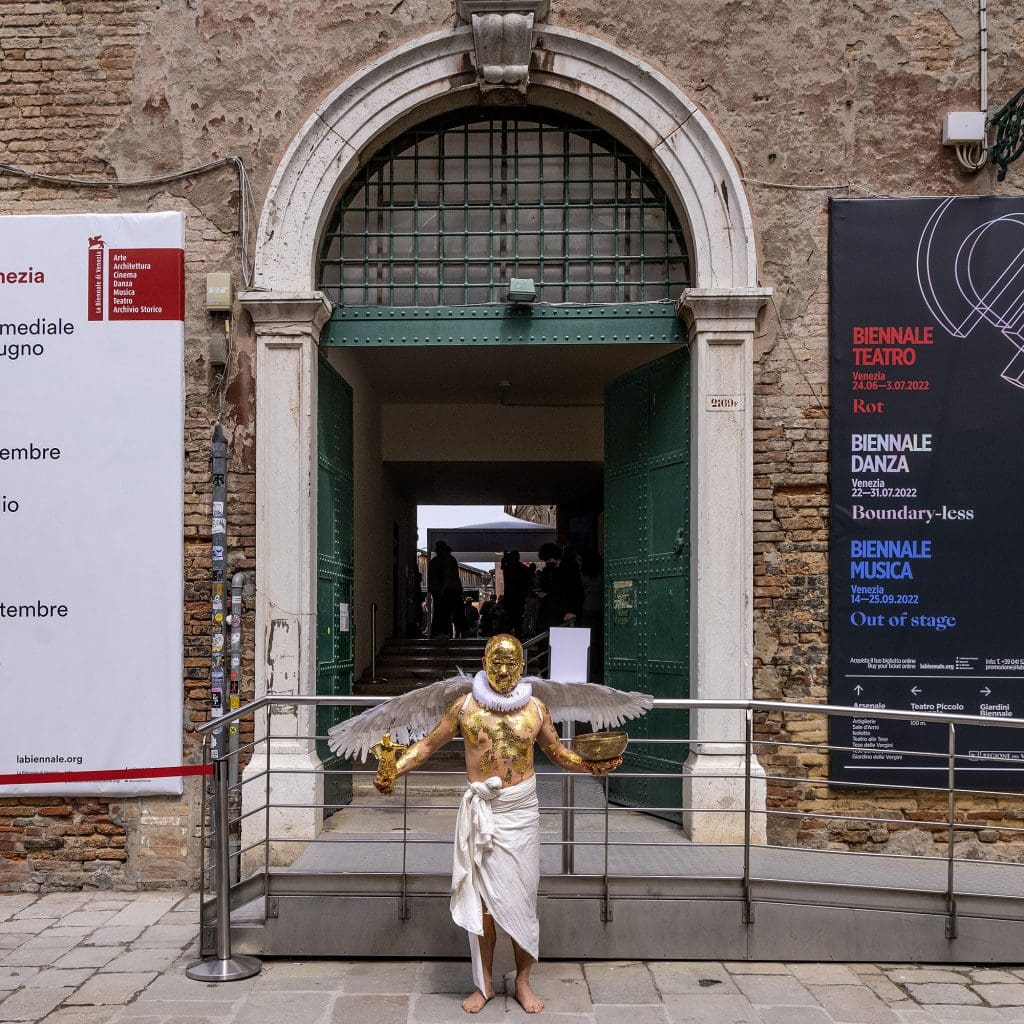 Chan Hin Io of YiiMa dressed as a golden angel for the opening of “Allegory of Dreams” at this year’s Venice Biennale